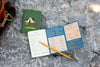 Product photo of Camping Notebook, a novelty gift manufactured by The Unemployed Philosophers Guild.