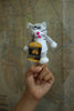 Product photo of Schrodinger's Cat Finger Puppet, a novelty gift manufactured by The Unemployed Philosophers Guild.