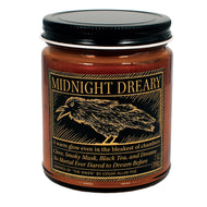 Candle jar labeled 'Midnight Dreary' with a black lid on a white background