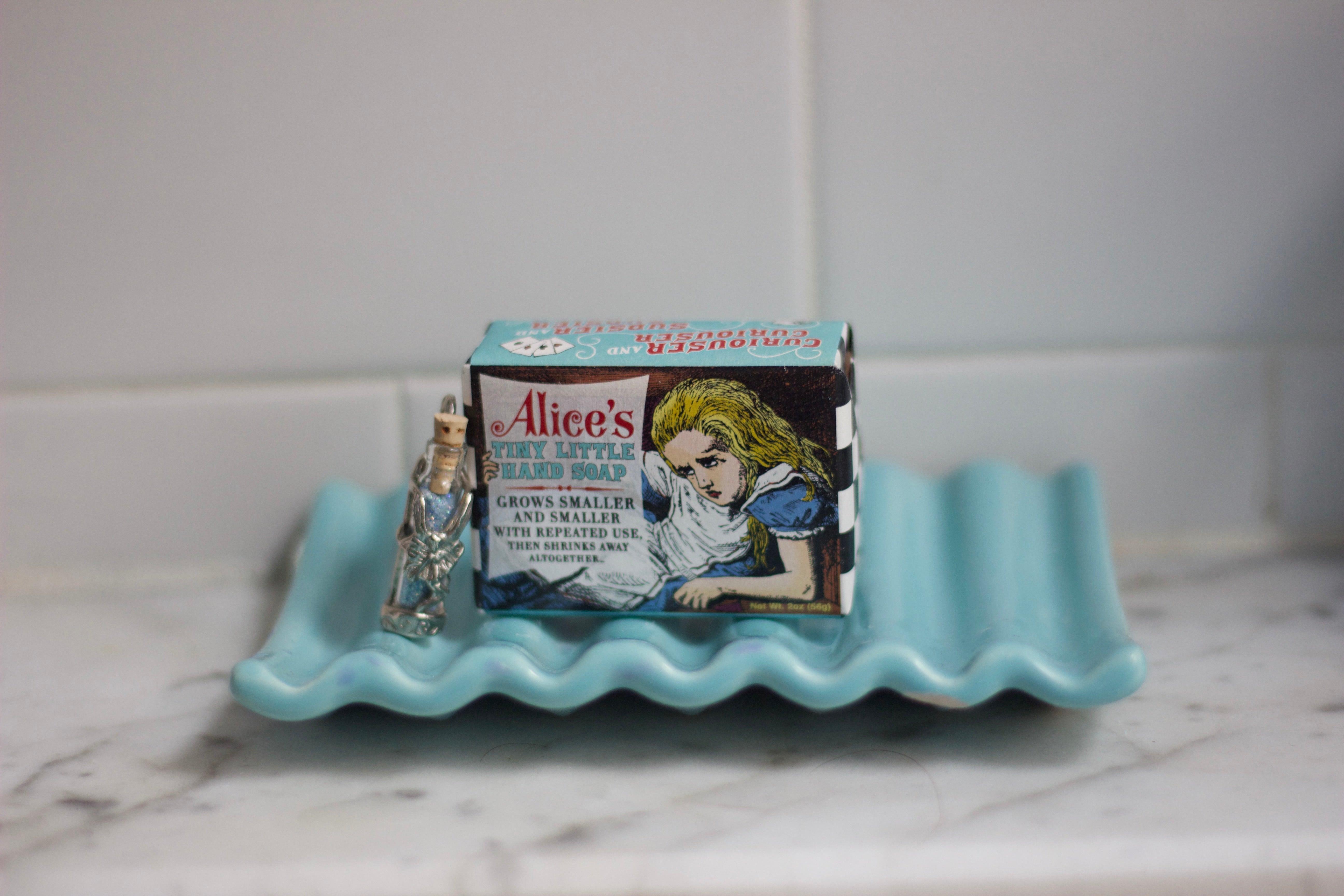 Product photo of Alice's Tiny Hand Soap, a novelty gift manufactured by The Unemployed Philosophers Guild.