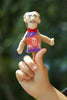 Product photo of Carl Sagan Finger Puppet, a novelty gift manufactured by The Unemployed Philosophers Guild.