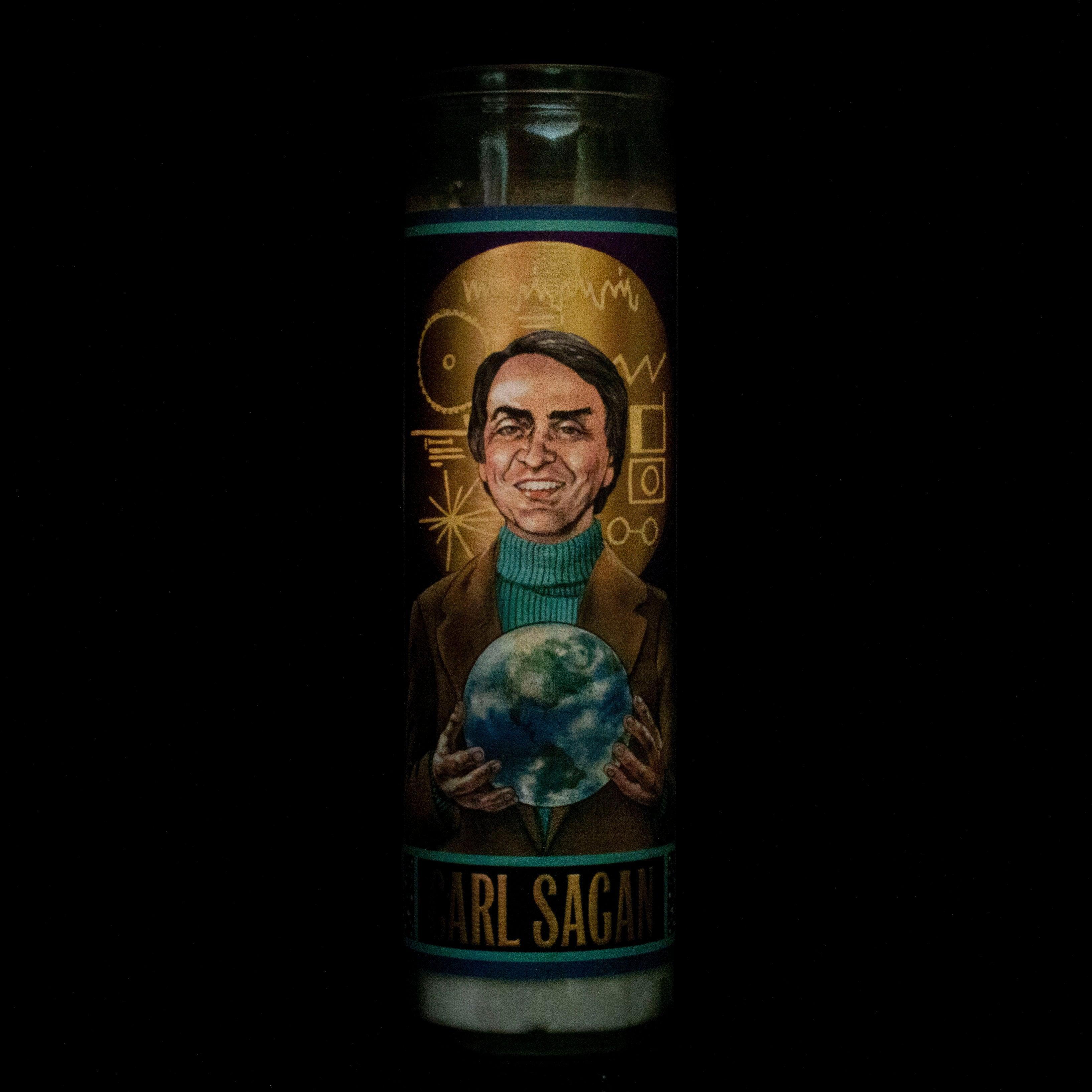 Product photo of Carl Sagan Secular Saint Candle, a novelty gift manufactured by The Unemployed Philosophers Guild.