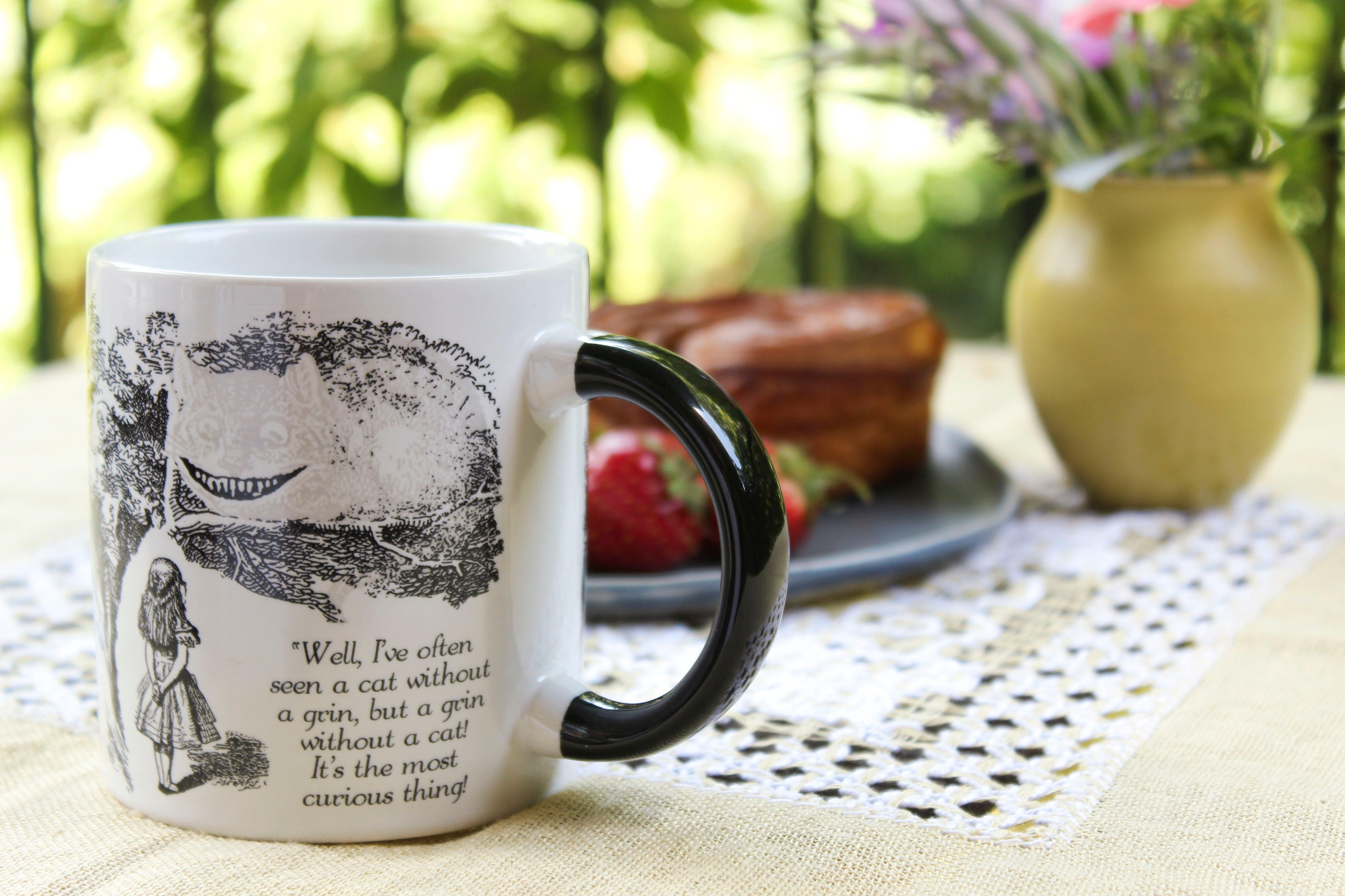 Product photo of Cheshire Cat Heat-Changing Mug, a novelty gift manufactured by The Unemployed Philosophers Guild.