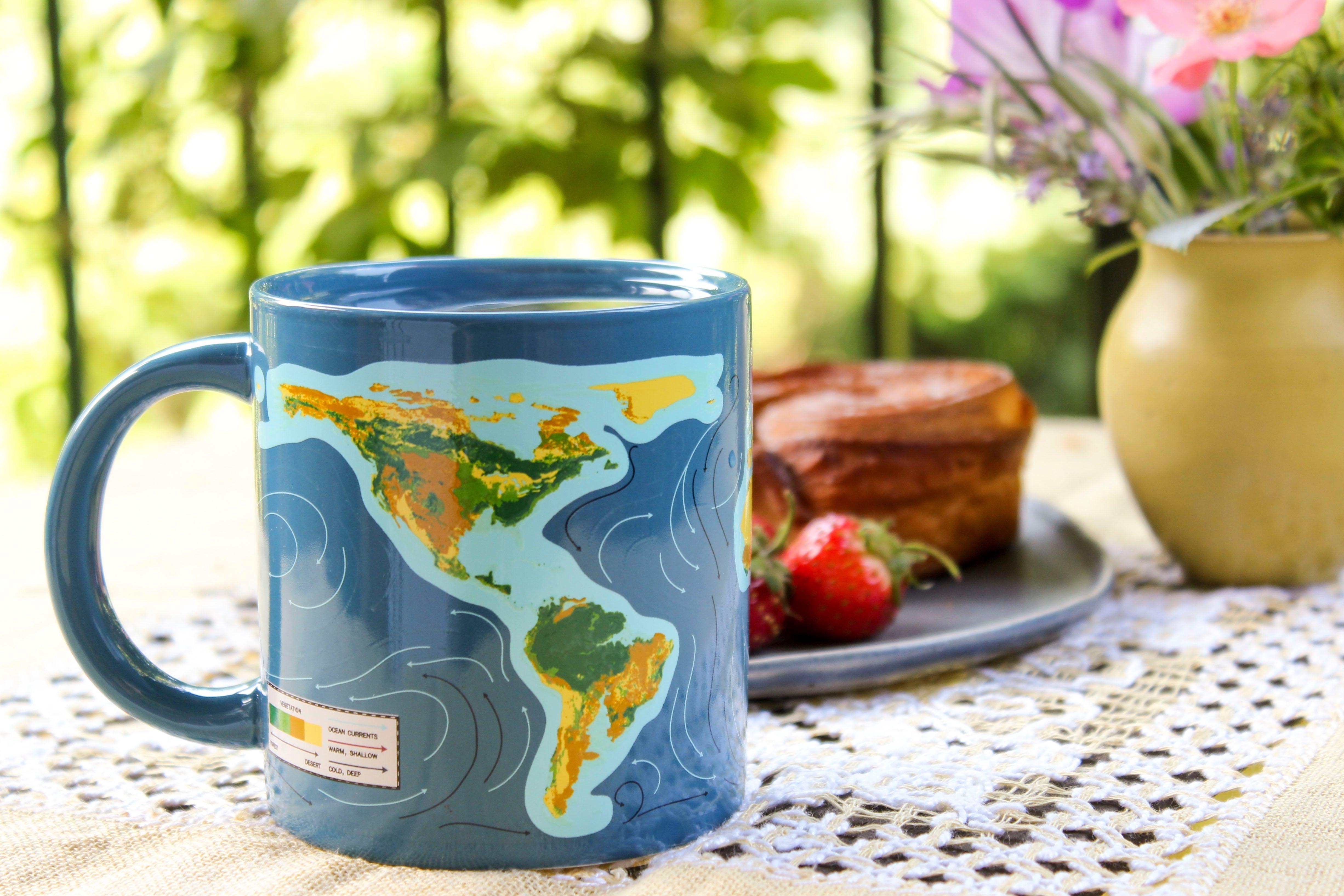 Product photo of Climate Change Heat-Changing Mug, a novelty gift manufactured by The Unemployed Philosophers Guild.