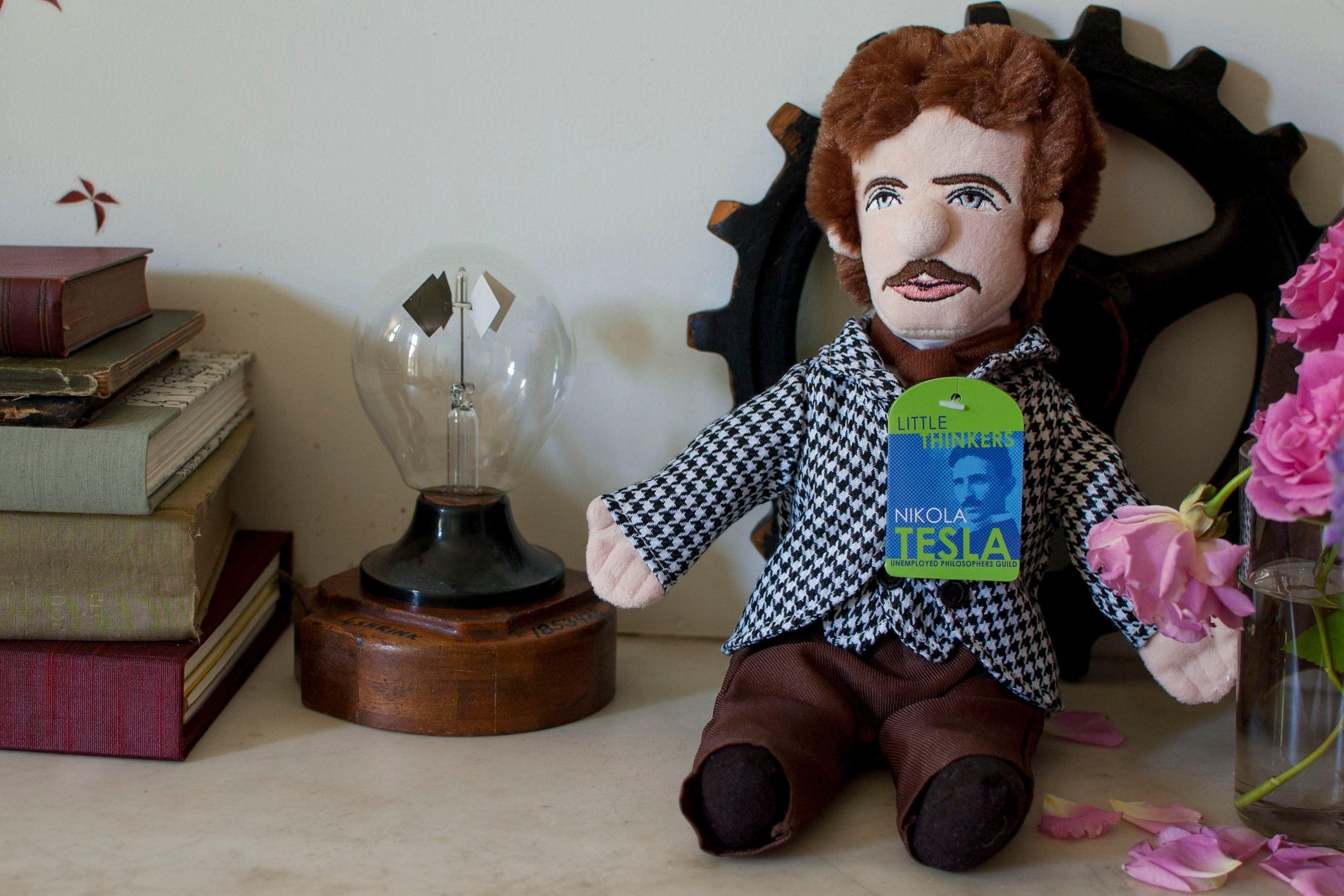 Product photo of Nikola Tesla Plush Doll, a novelty gift manufactured by The Unemployed Philosophers Guild.