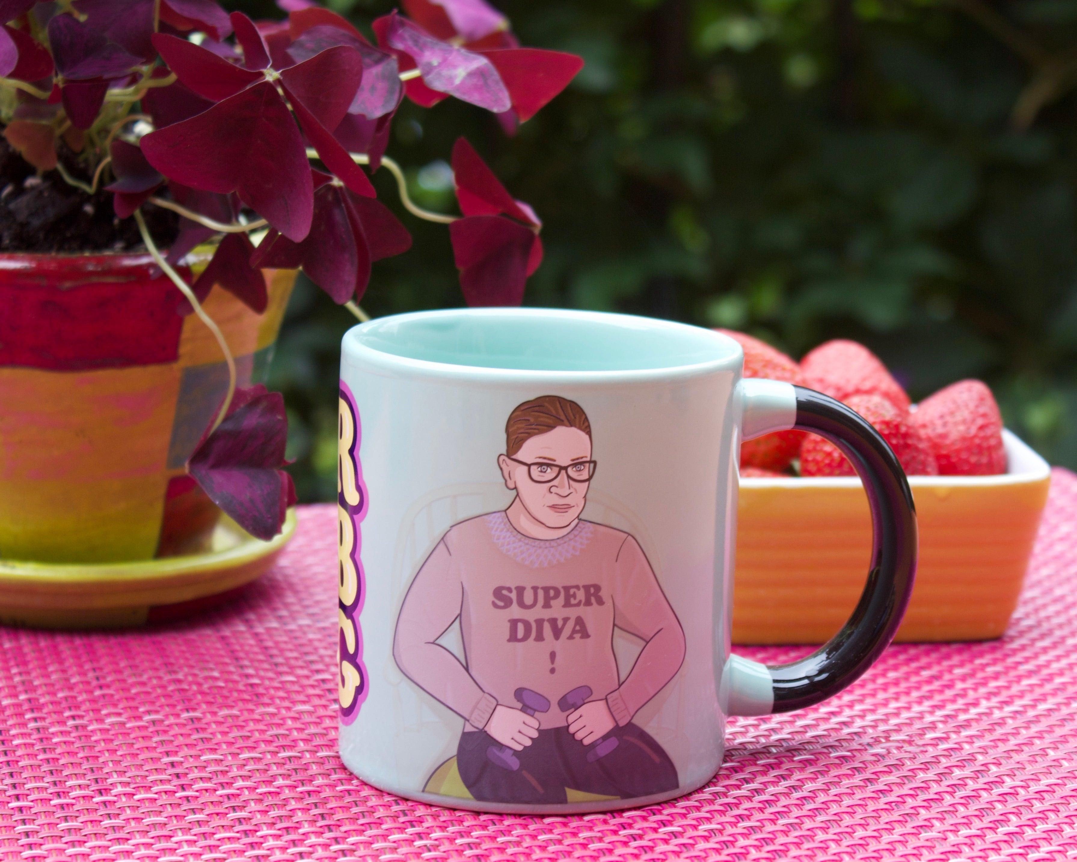 Product photo of Ruth Bader Ginsburg Heat-Changing Mug, a novelty gift manufactured by The Unemployed Philosophers Guild.